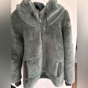 G.I.G.A. DX Women’s hooded jacket. Never worn. Size 12. Green blue Sherpa.